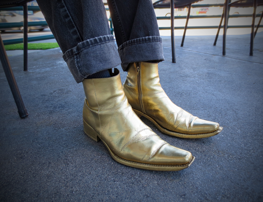 Gold boots fashion concept shot
